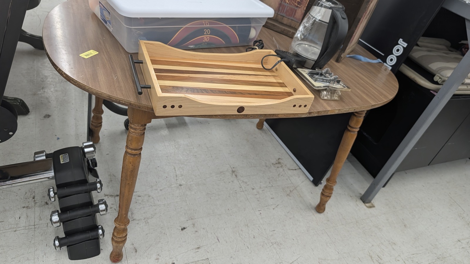 Wood table and household tools on the Thornton sales floor