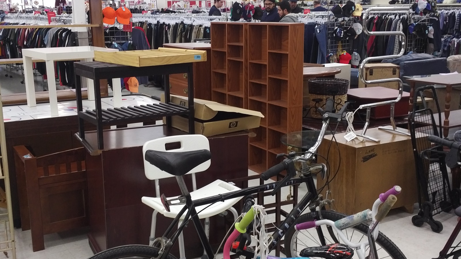 Wood furniture, chairs, and bicycles on the Westminster sales floor