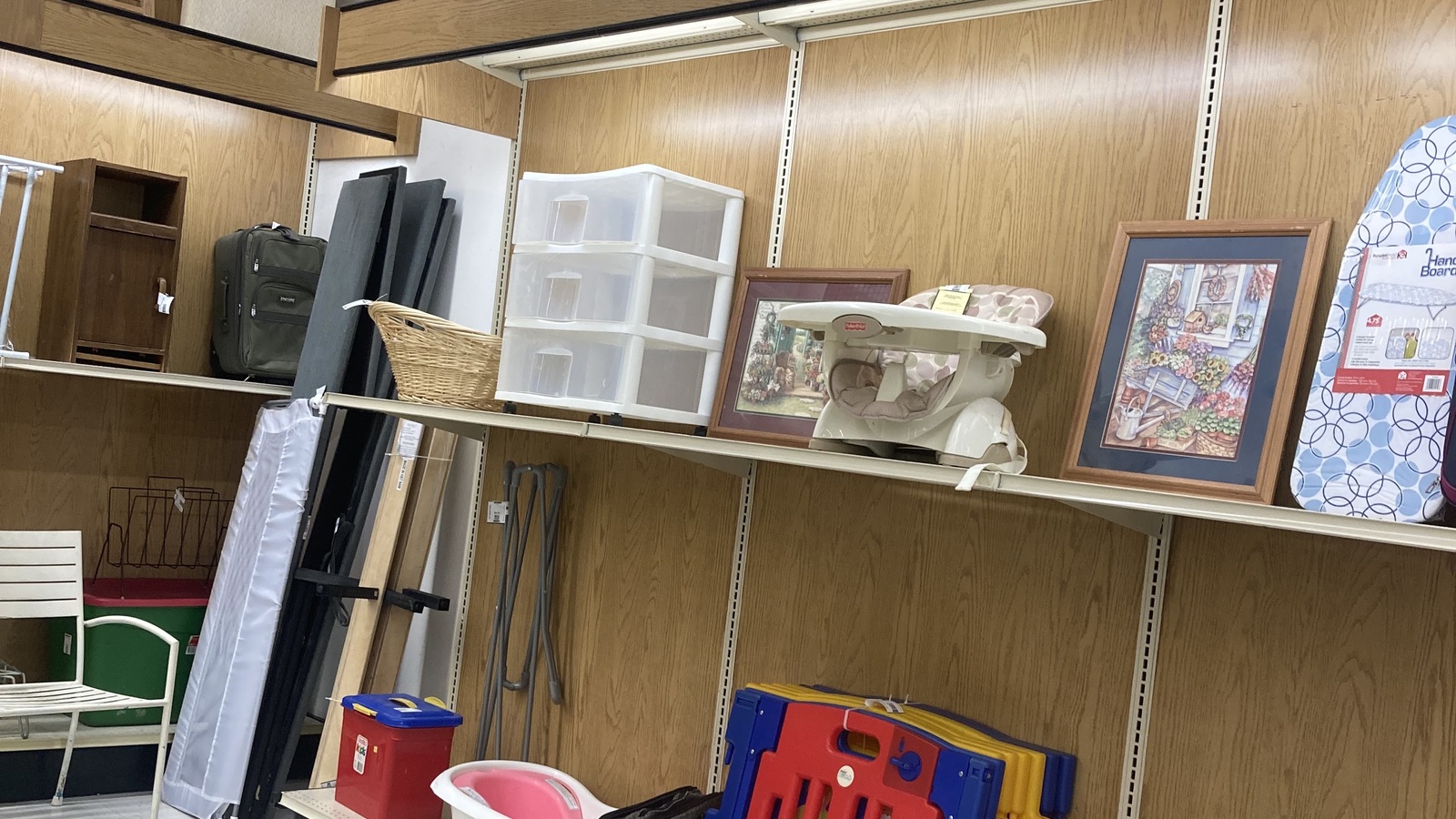 Shelving, framed art, and home furnishings at Valley Thrift Store in Fairfield