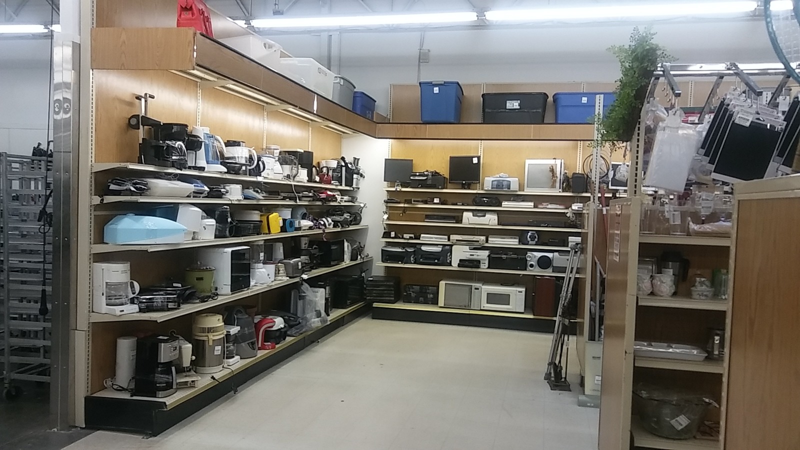 Shelves of small appliances and electronics at Valley Thrift Store near Dayton