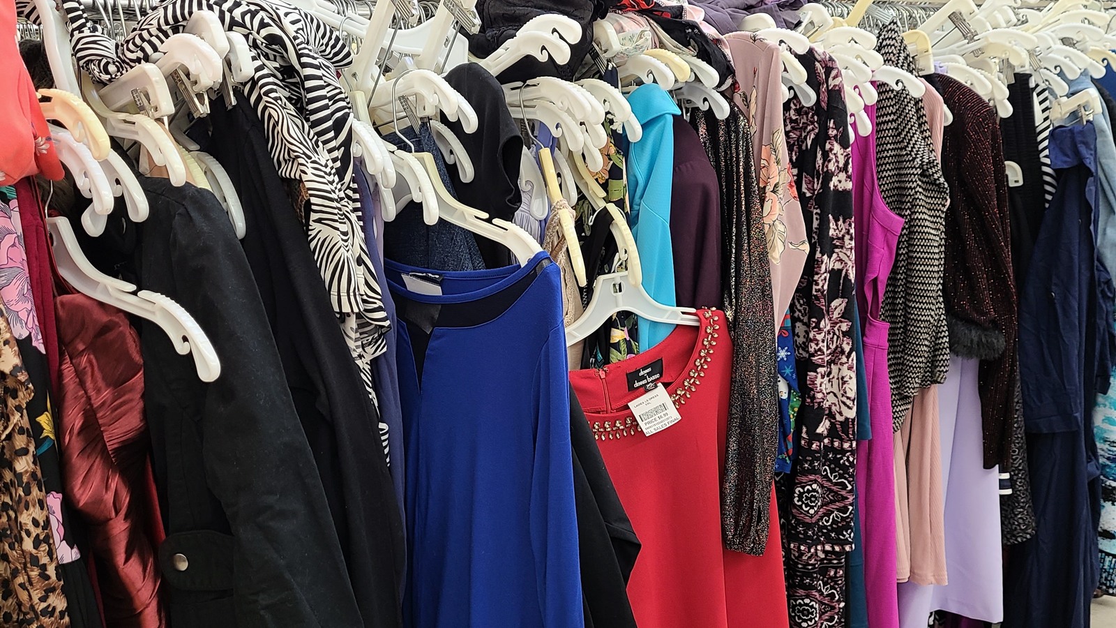 Dresses and everyday fashion arranged by style at Valley Thrift Store in Kettering