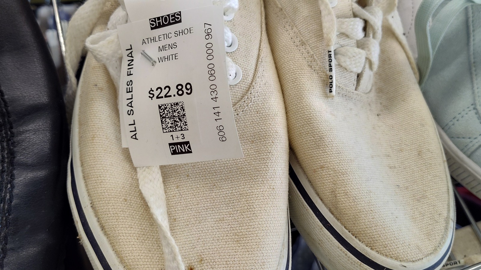 Pair of light athletic shoes in the footwear section at Valley Thrift Store