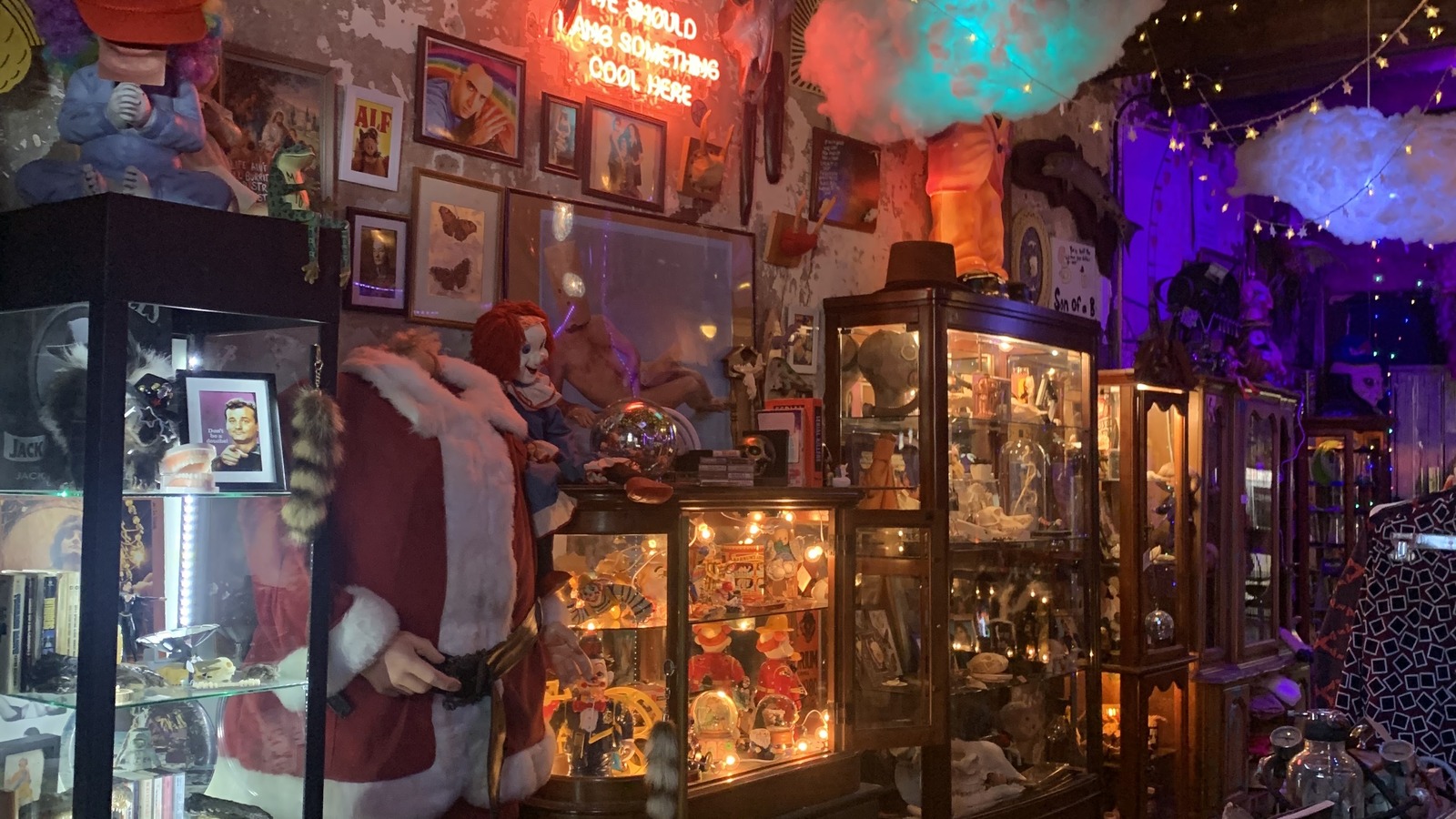 Colorful cabinets, strange collectibles, and glowing displays inside Major Tomms Oddities and Vintage in Winston-Salem