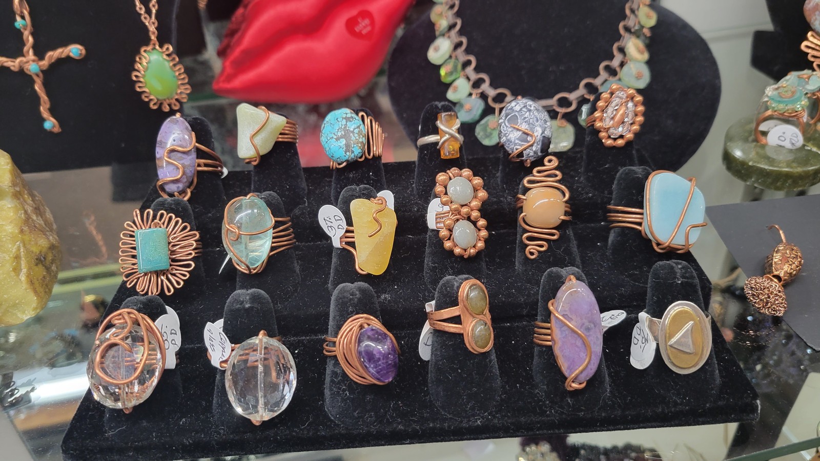 Colorful rings, pendants, and statement jewelry at White Rose Eclectics in Aiken