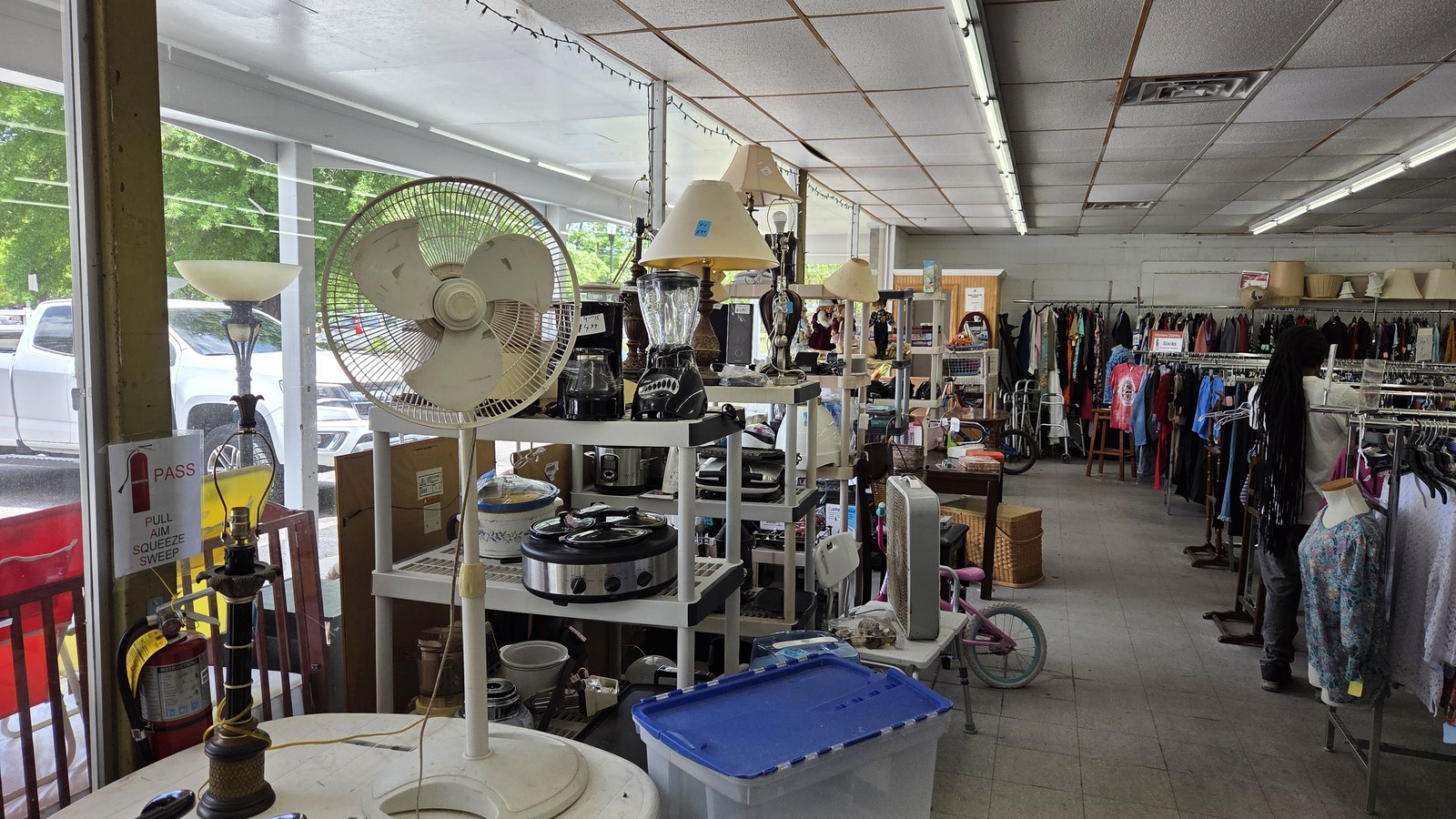 Lamps, clothing, and household goods inside the Salvation Army thrift store in Aiken