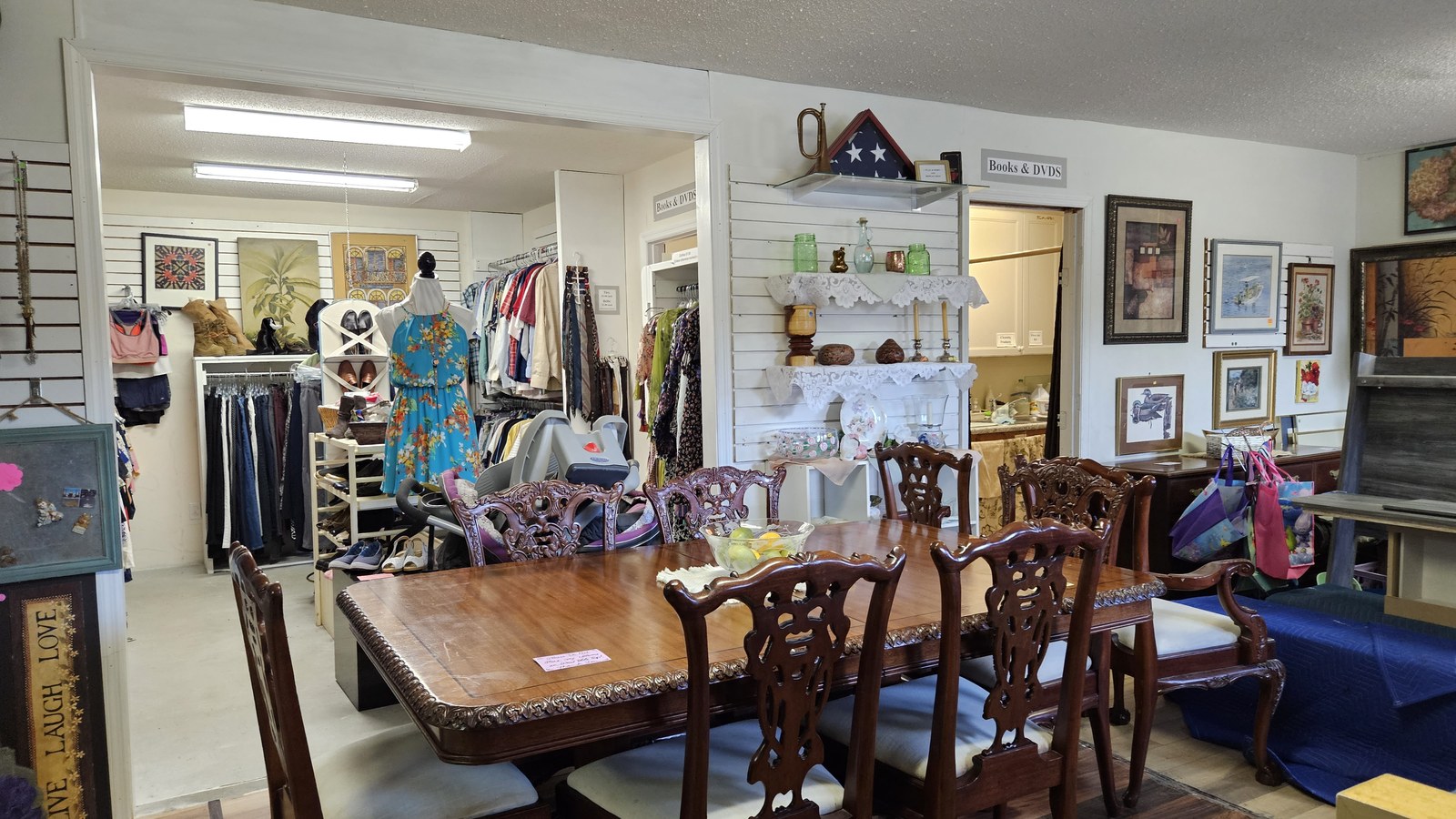 Chairs, framed art, and home goods at Veterans First Thrift Store in Beaufort