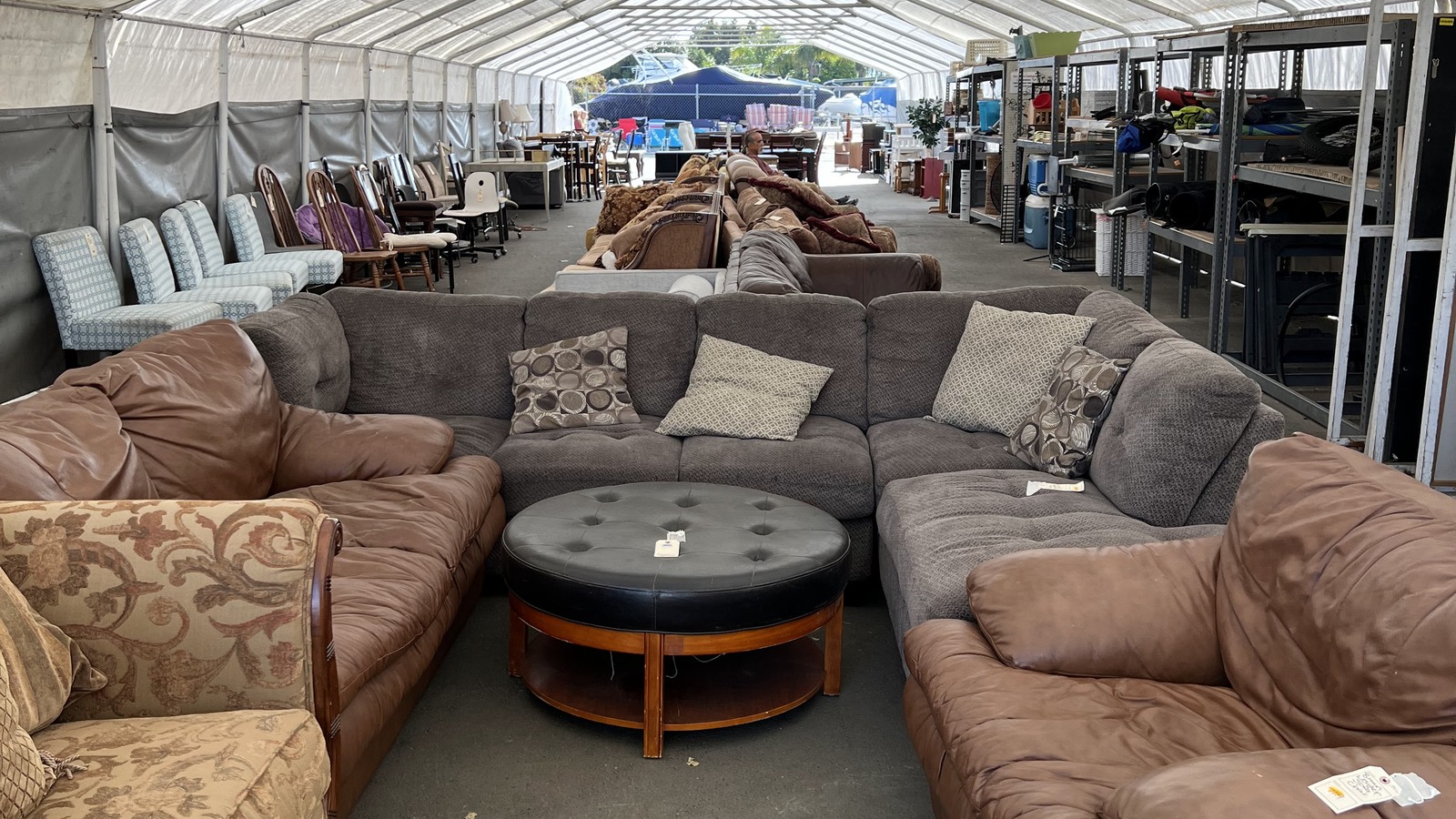 Sofas, tables, and shelving in the furniture showroom