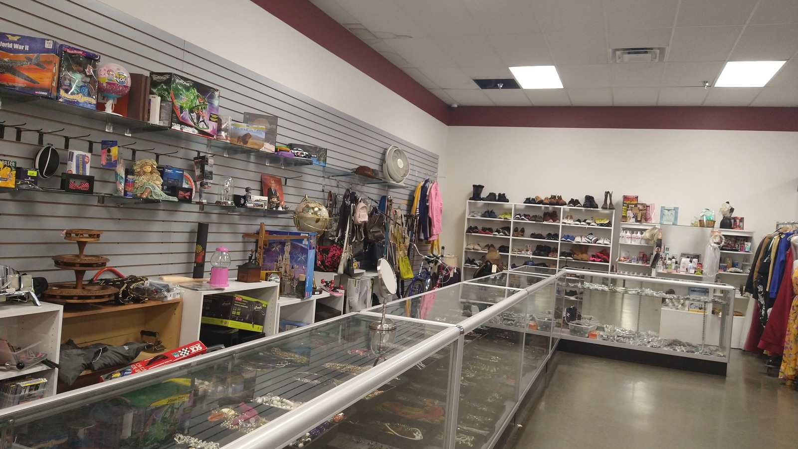 Jewelry cases and wall displays at 3 Way Thrift Store