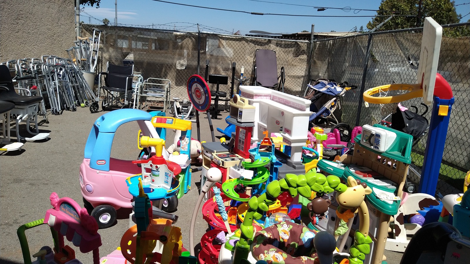 Colorful ride-on toys and children’s play equipment outdoors