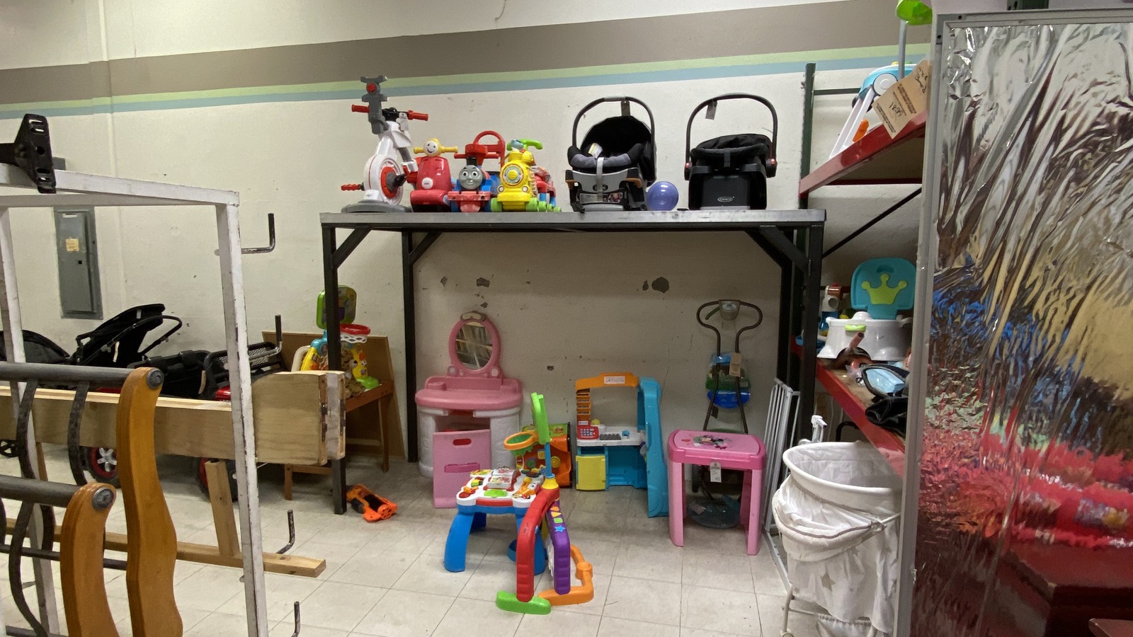 Colorful children's toys and small furniture in the family section