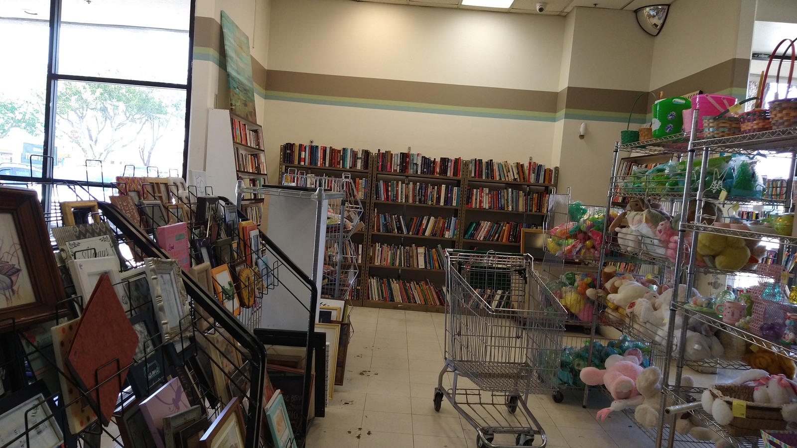 Bookcases and media shelves near the front windows