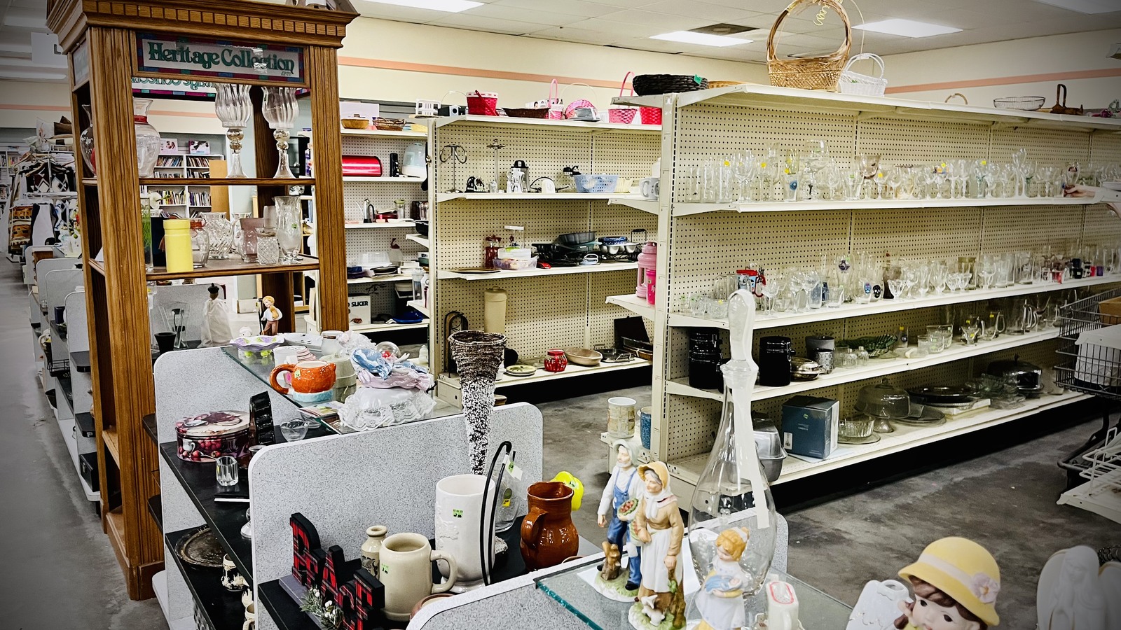 Glassware and decorative housewares across bright display shelves