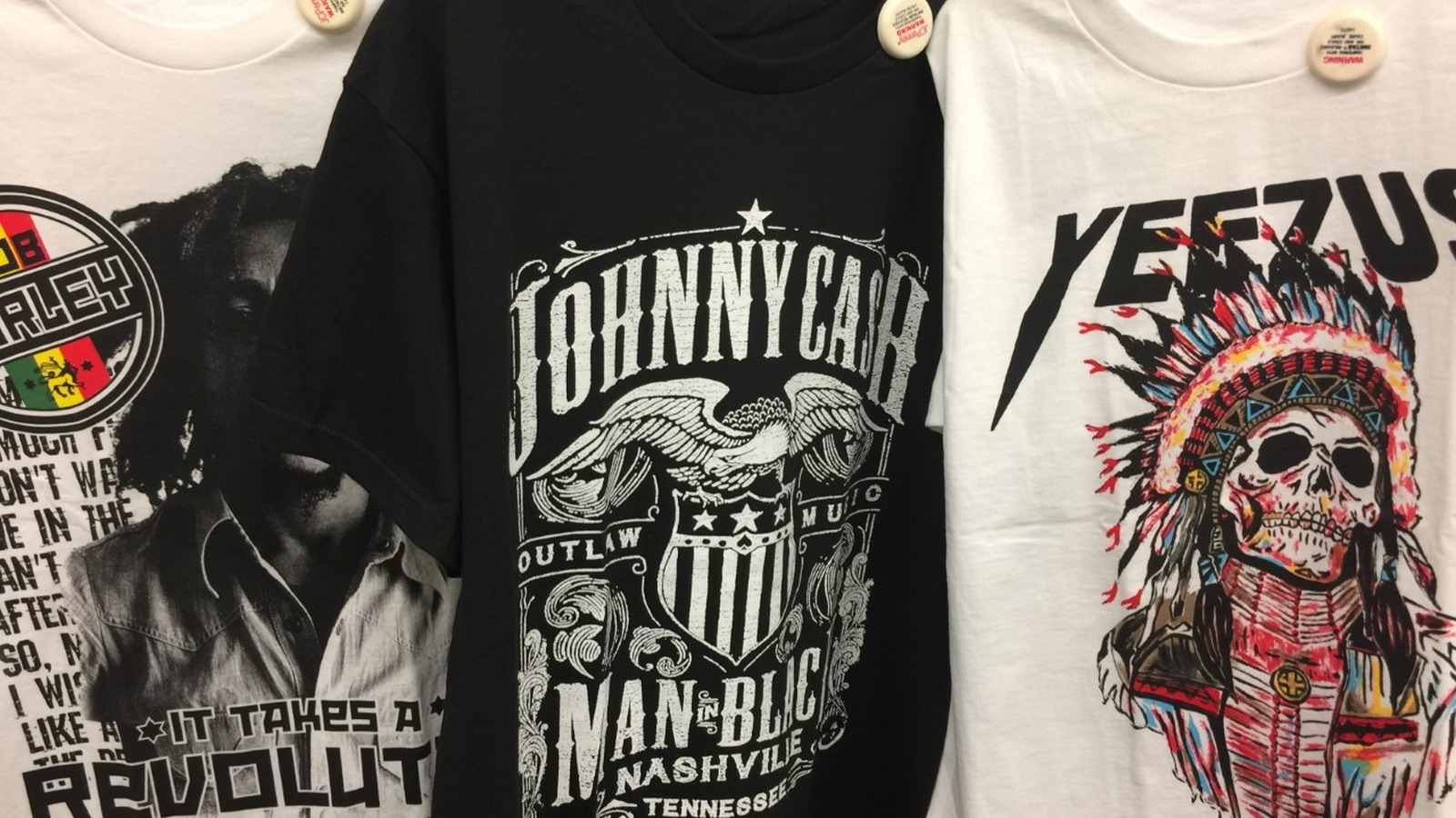 Bold music-themed graphic T-shirts on display