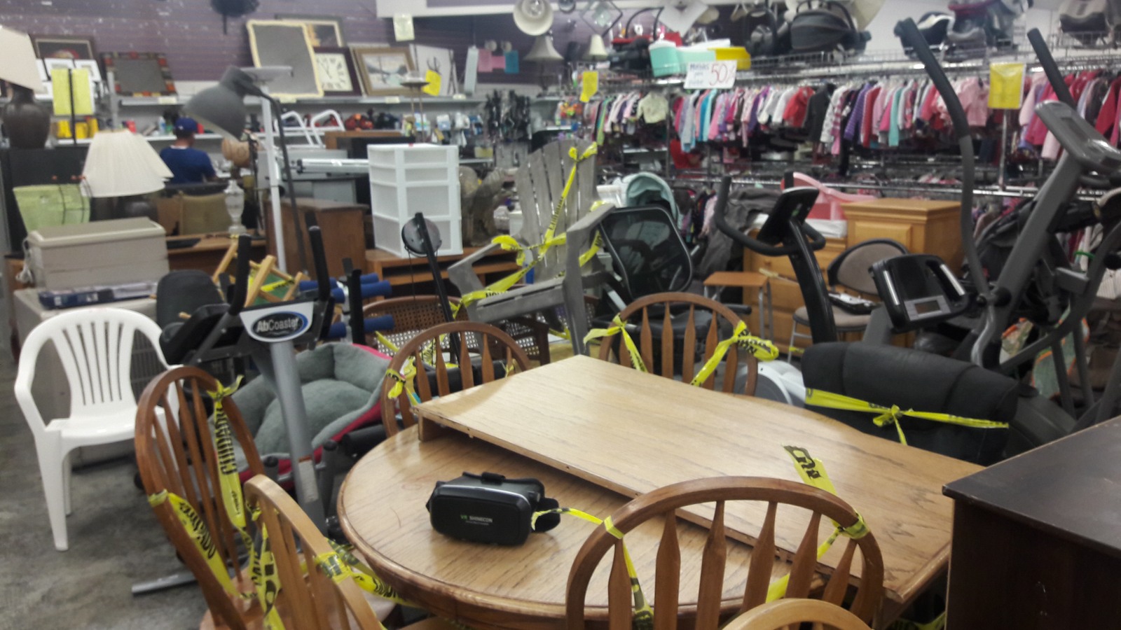 Tables, chairs, bicycles, and household furnishings on the sales floor