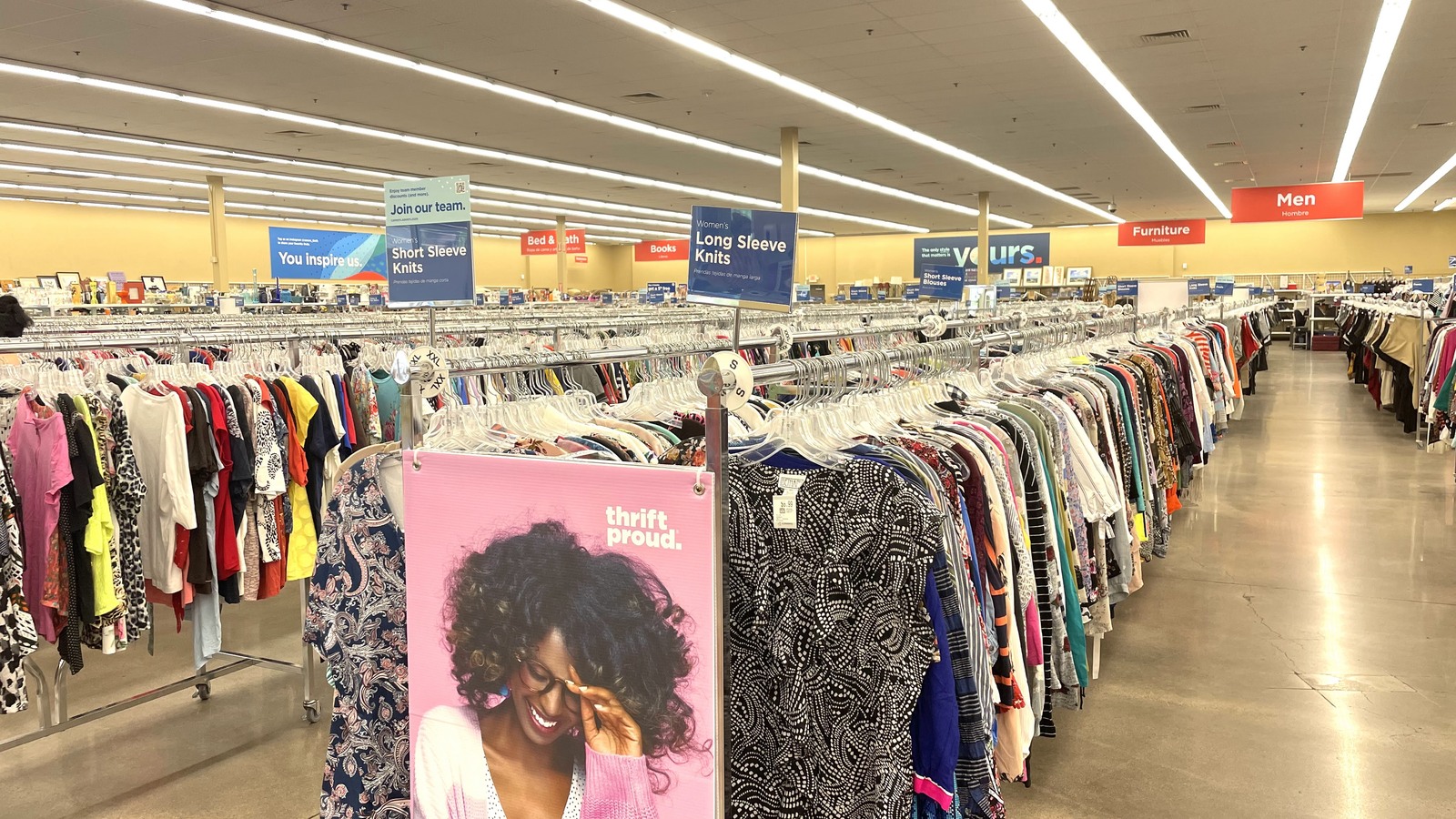 Long clothing racks across the spacious Savers sales floor in Scottsdale