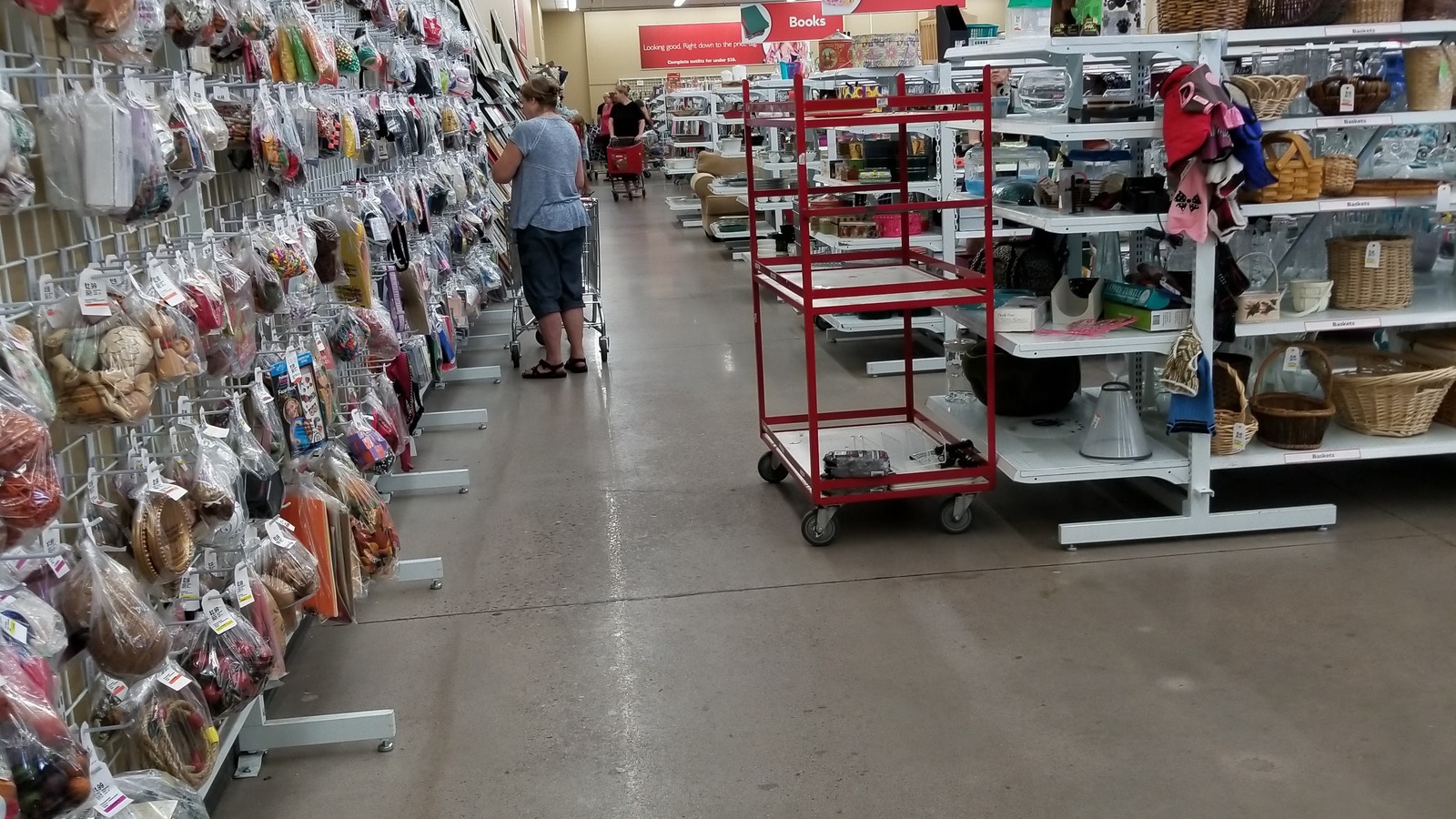 Broad housewares aisle filled with baskets and kitchen pieces