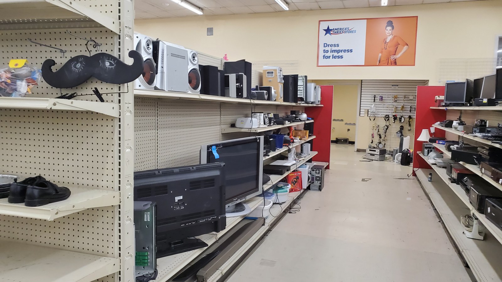 Speakers, televisions, printers, and small electronics on display
