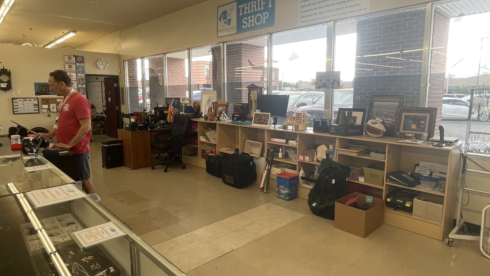 Front counter area with framed art and decorative pieces