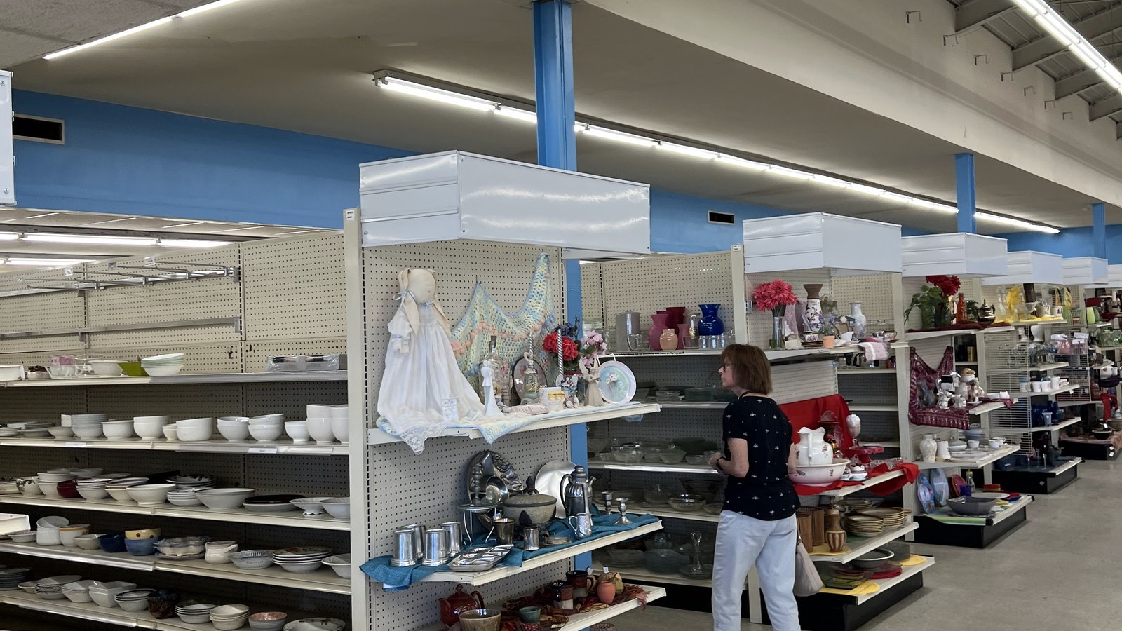 White dishes and home accents arranged in the housewares department