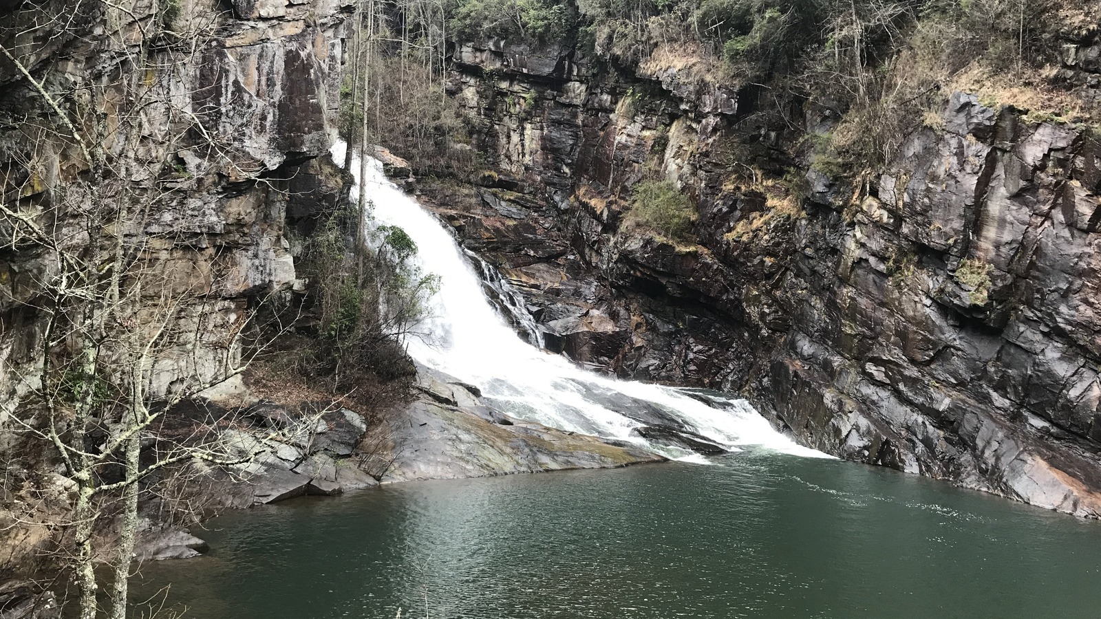 Hurricane Falls dropping through steep rock walls inside Tallulah Gorge State Park.