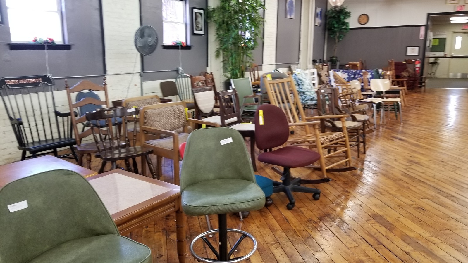 Dining chairs, office chairs, and small tables in the furniture department