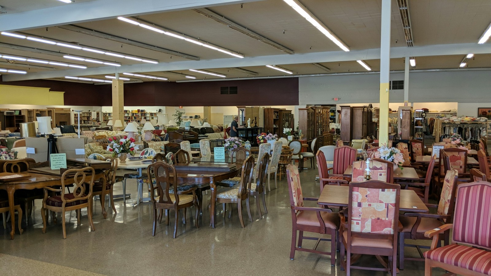 Tables, chairs, and sofas across the Lutheran Thrift Shop furniture floor