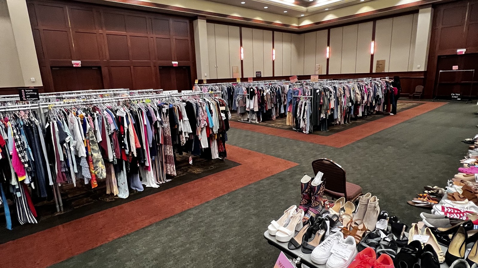Clothing racks and shoe tables at a Statemint Maryville consignment sale