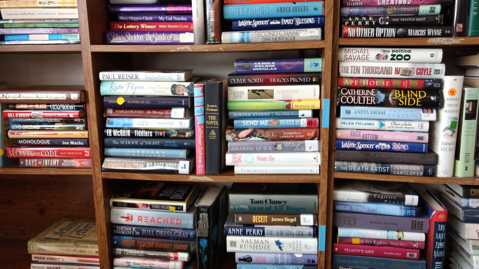 Shelves packed with secondhand books at St. Teresa's Buyers Bargain Shop
