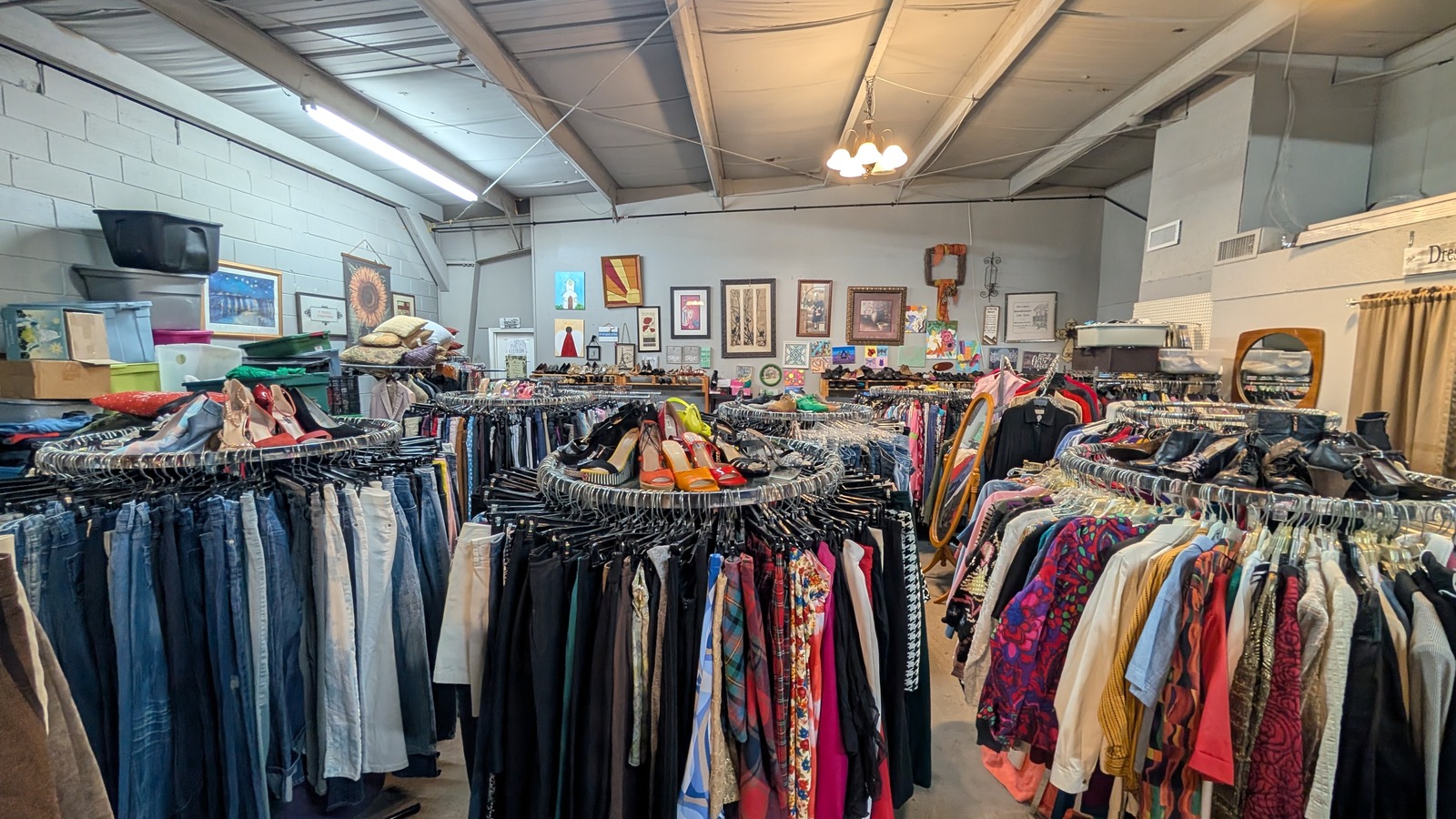 Colorful clothing racks filling Kim K's Thrift Store in Gulfport
