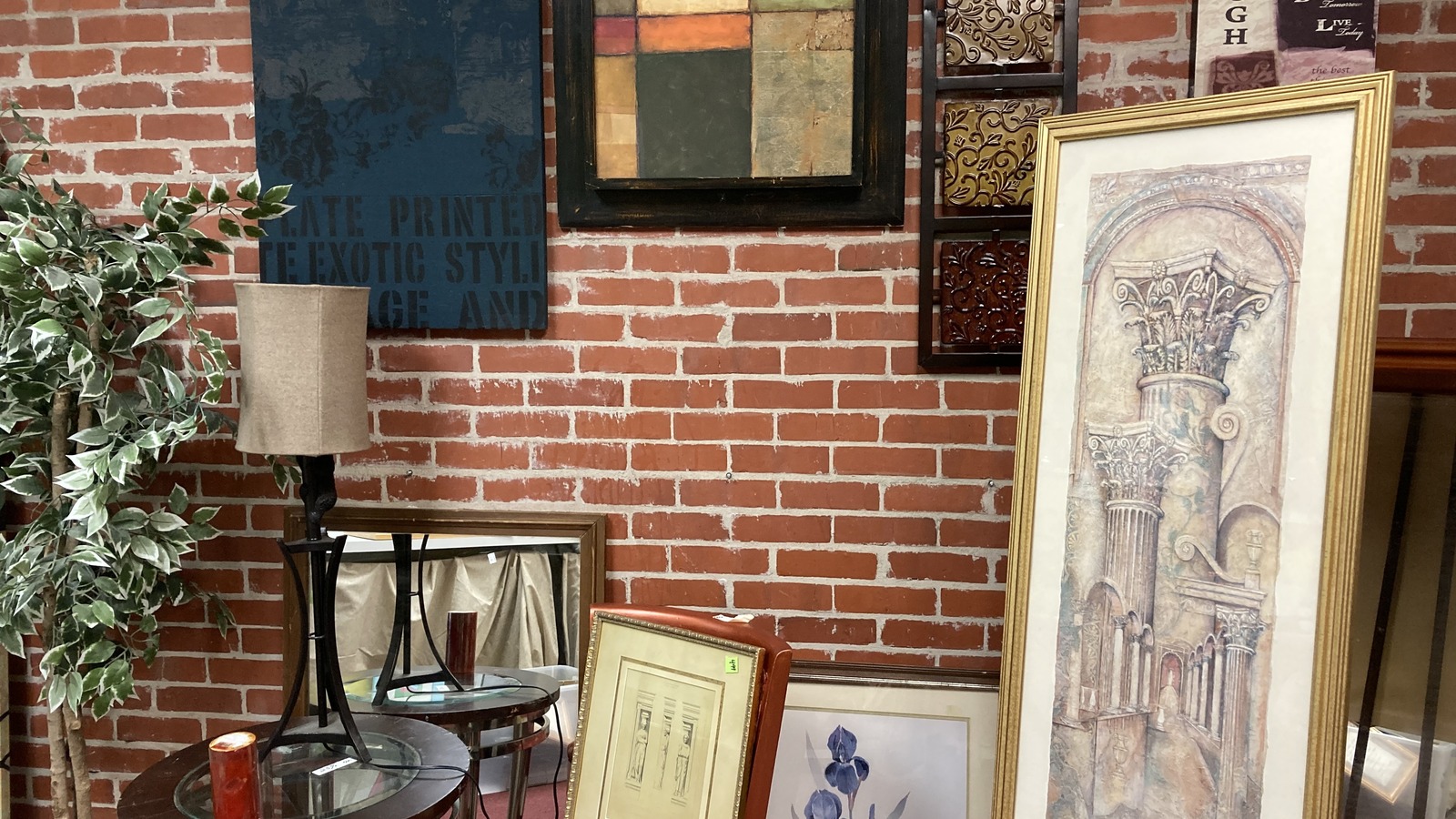 Framed art and home accents at Barkin' Basement Thrift Shop in Gulfport