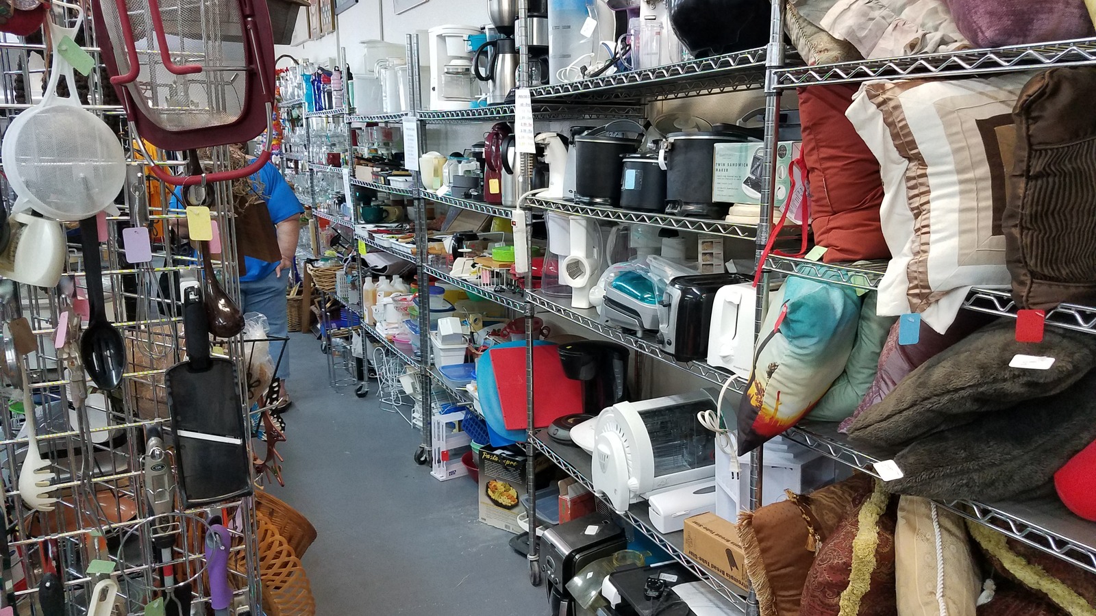 Neatly arranged merchandise inside Hands Extended Thrift Store in Yuma