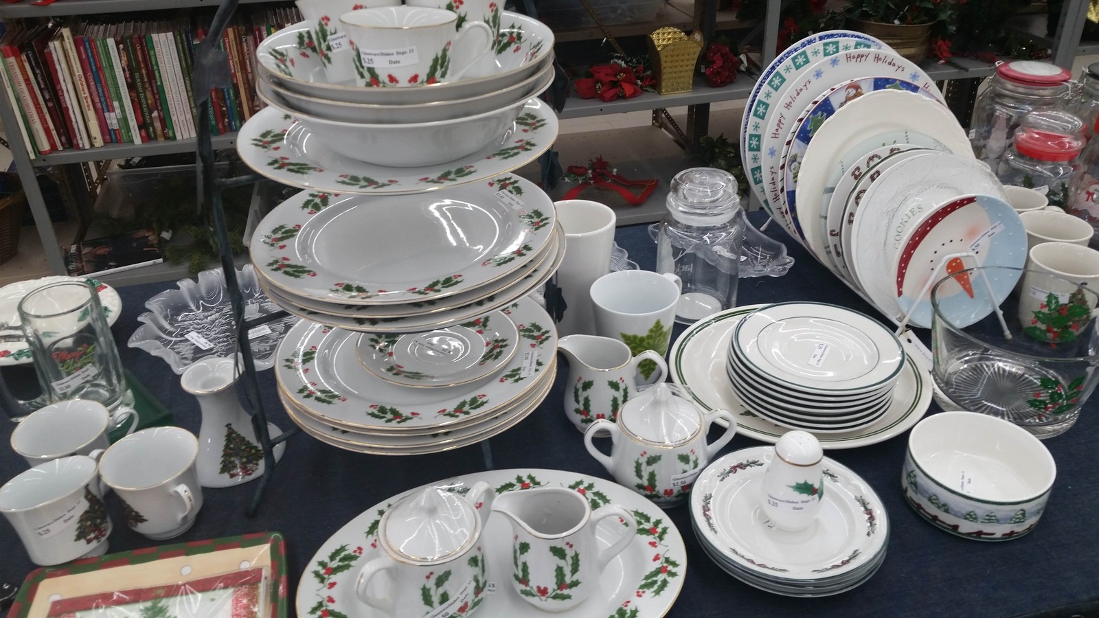 Stacks of patterned china and dishes at AuthoraCare Hospice Thrift Store