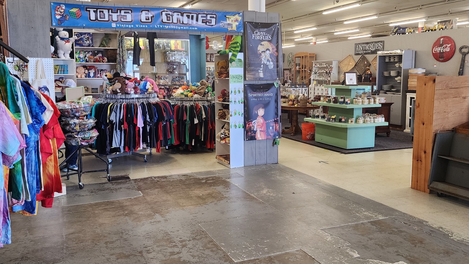 Clothing racks near the entrance to the apparel department