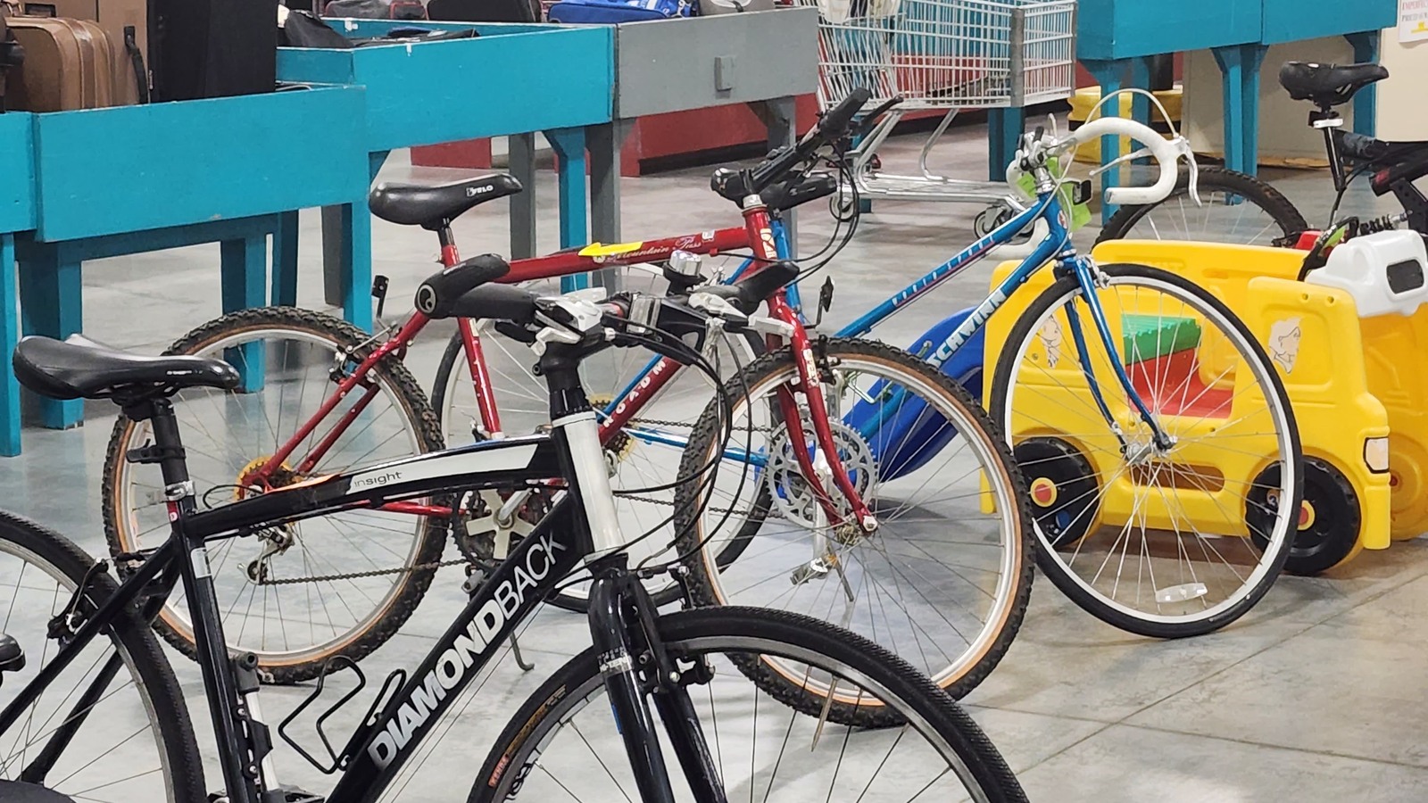 Bicycles and outdoor equipment grouped together on the sales floor