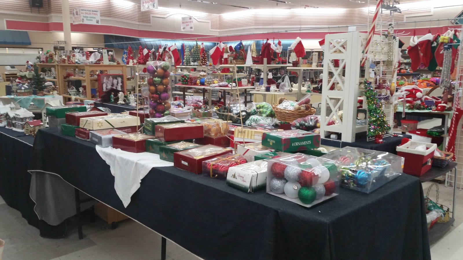 Holiday decorations and seasonal goods on a central display