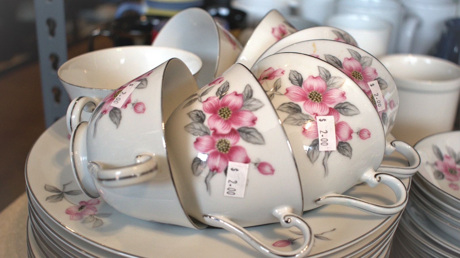 Floral teacups and saucers among Brown Elephant's vintage housewares