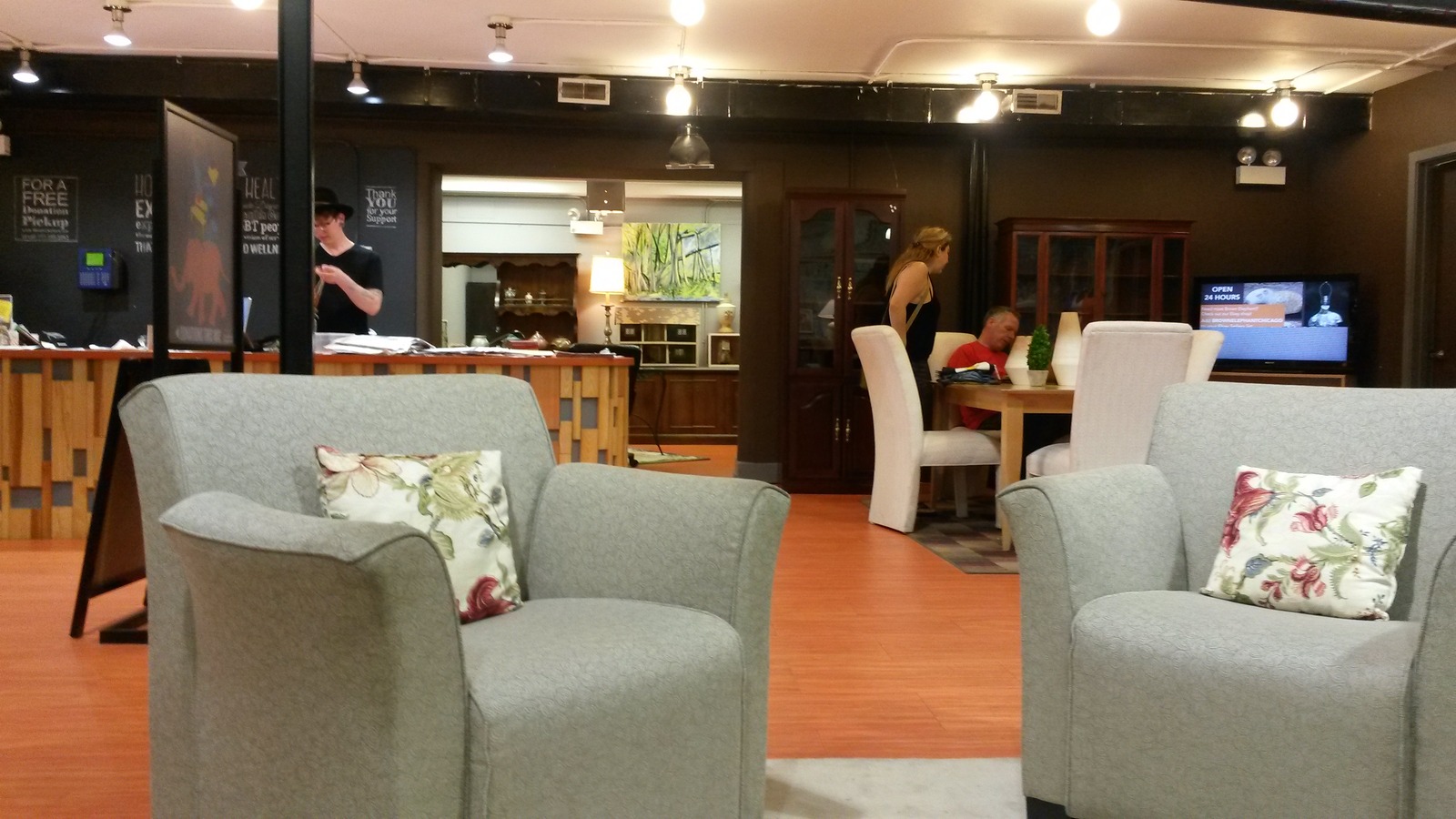 Sofas and lounge furniture arranged inside Brown Elephant Andersonville