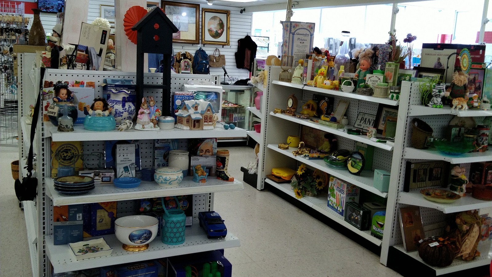 Housewares and decorative goods filling shelves at Ohio Thrift Store