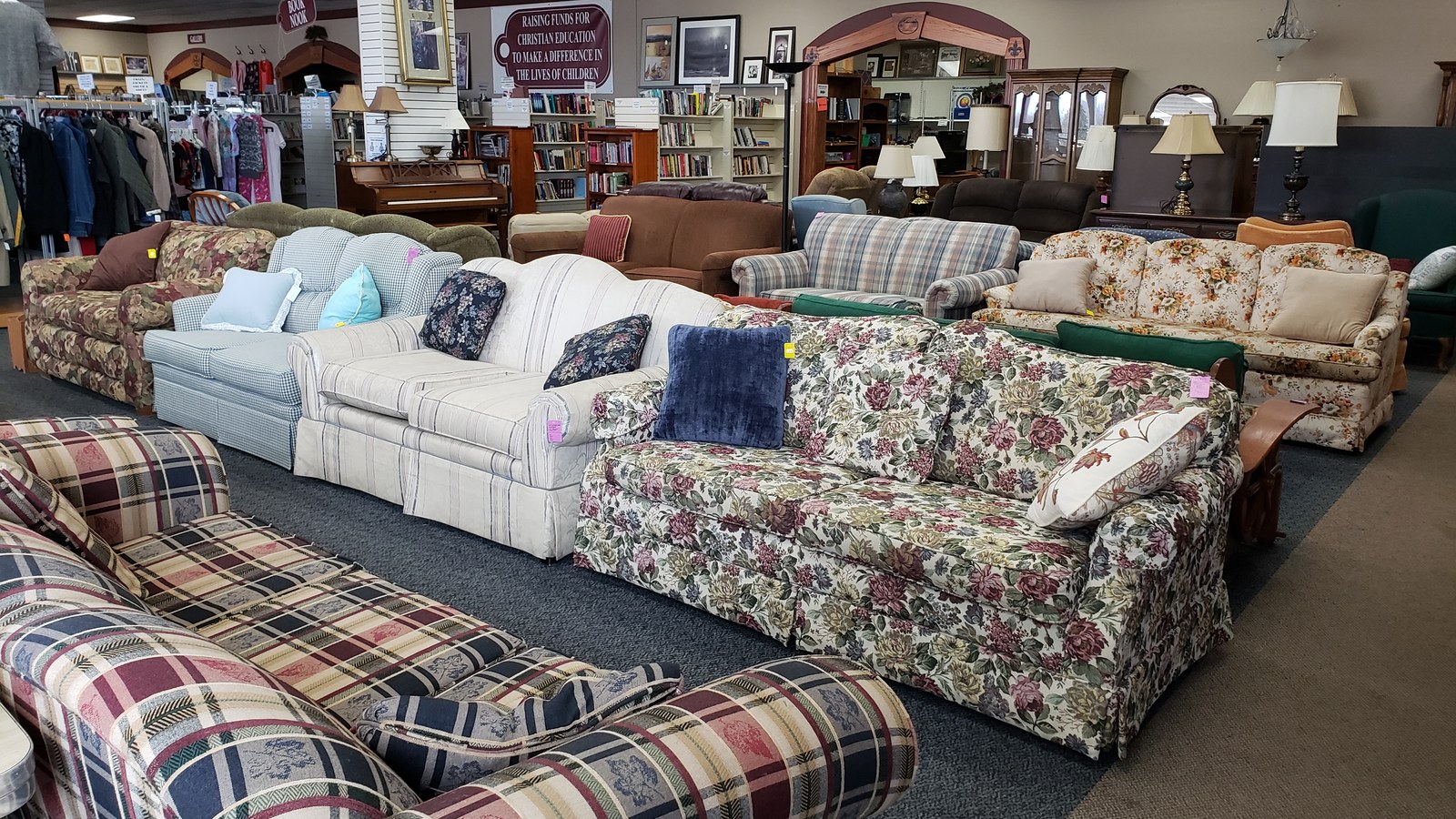 Rows of sofas and upholstered chairs on the Fair Market furniture floor