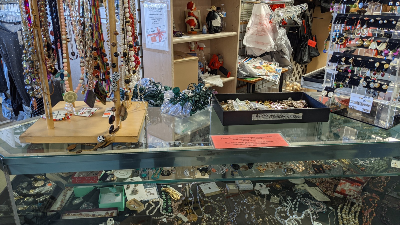 Necklaces and small accessories displayed inside a jewelry case