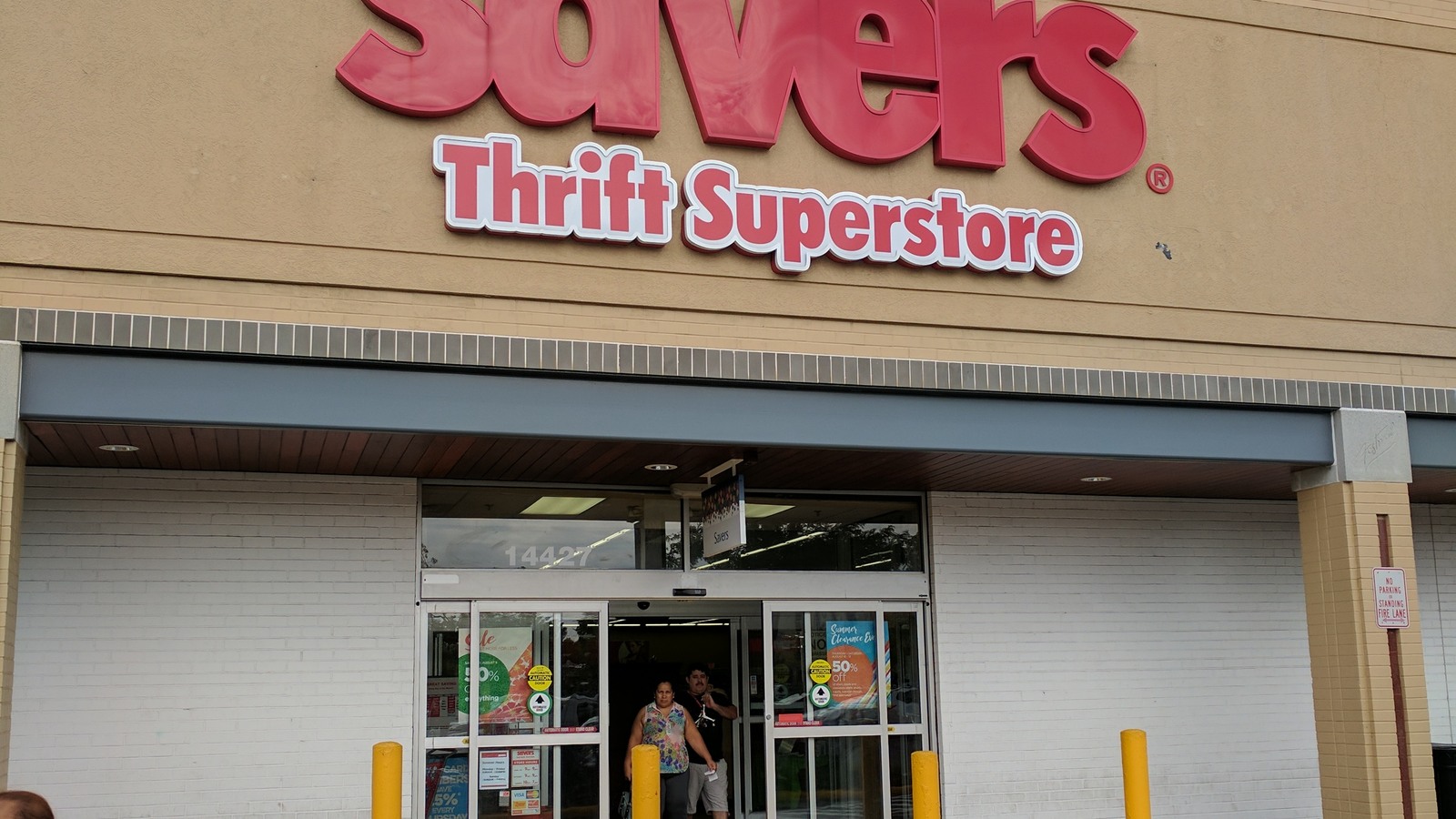 Savers entrance beneath the red Thrift Superstore sign