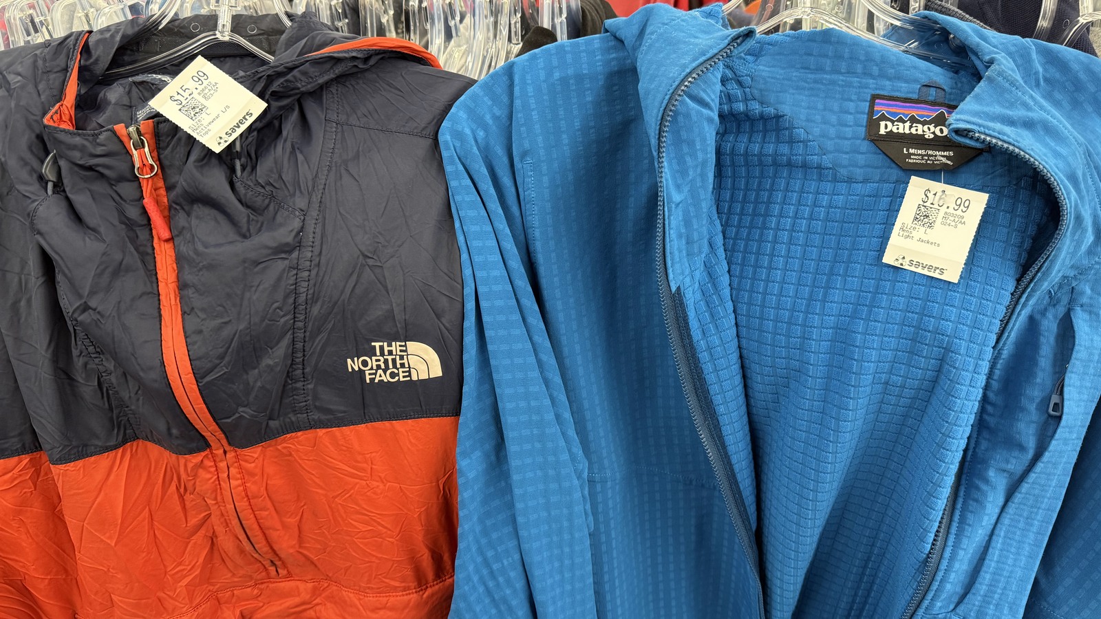 Colorful outdoor jackets hanging on an apparel rack