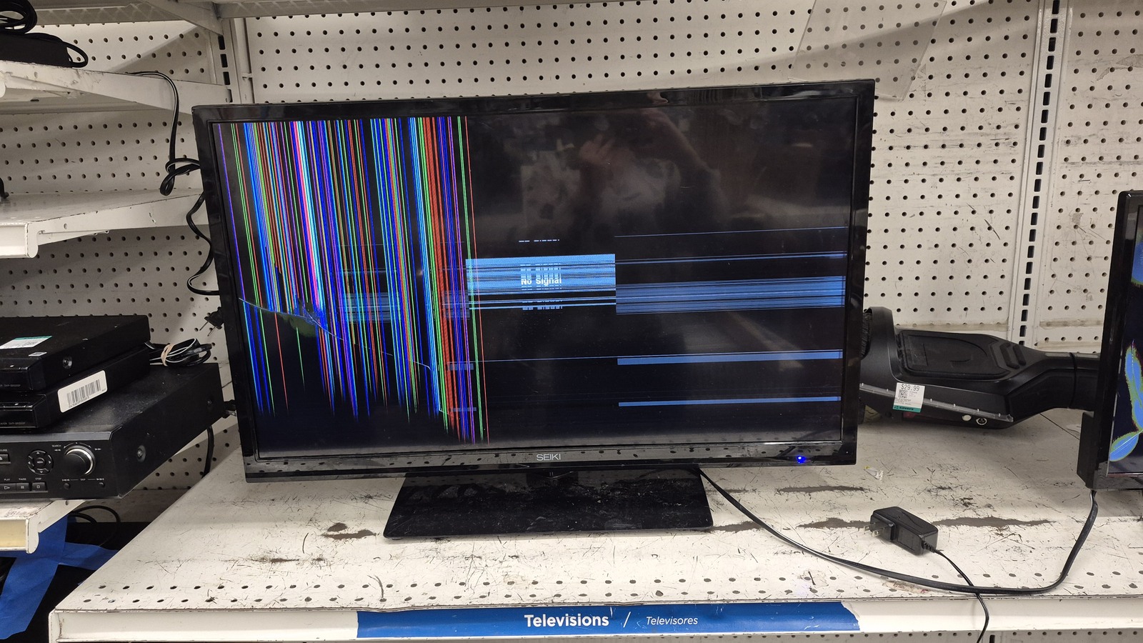 Television and electronic components on a store shelf