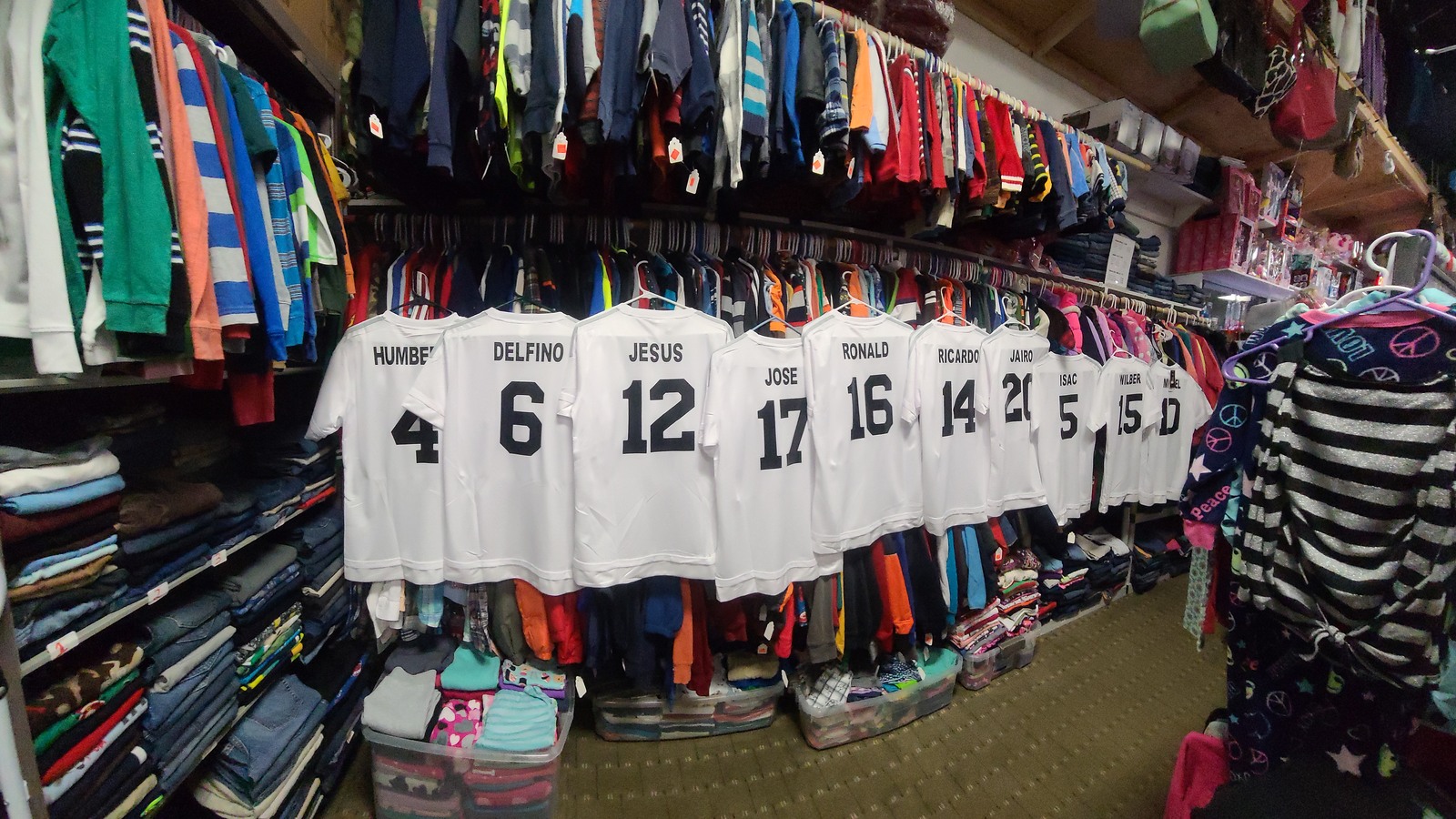 Jerseys and shirts lining the walls and center displays