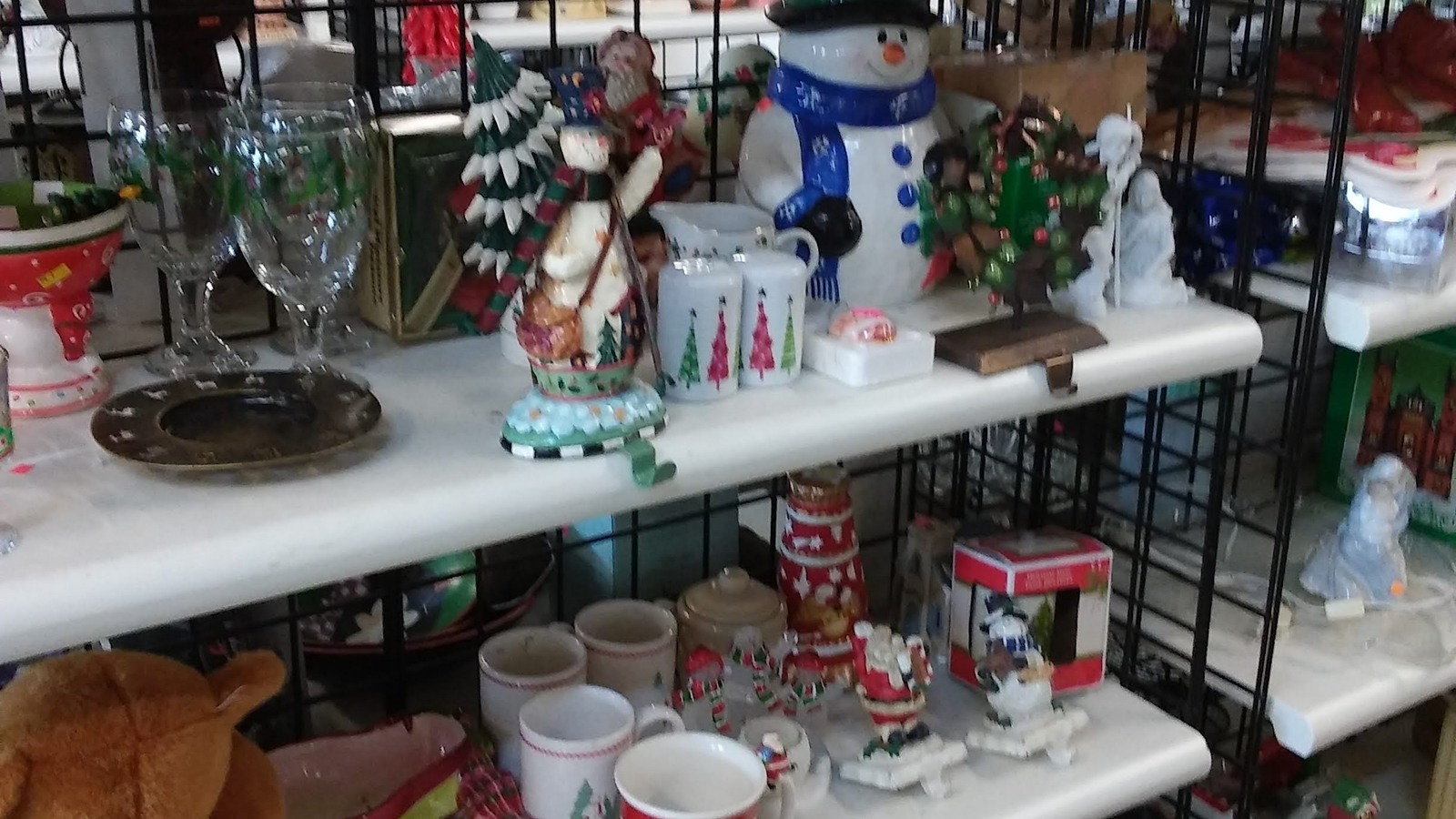 Glass and ceramic decorations lined across store shelves