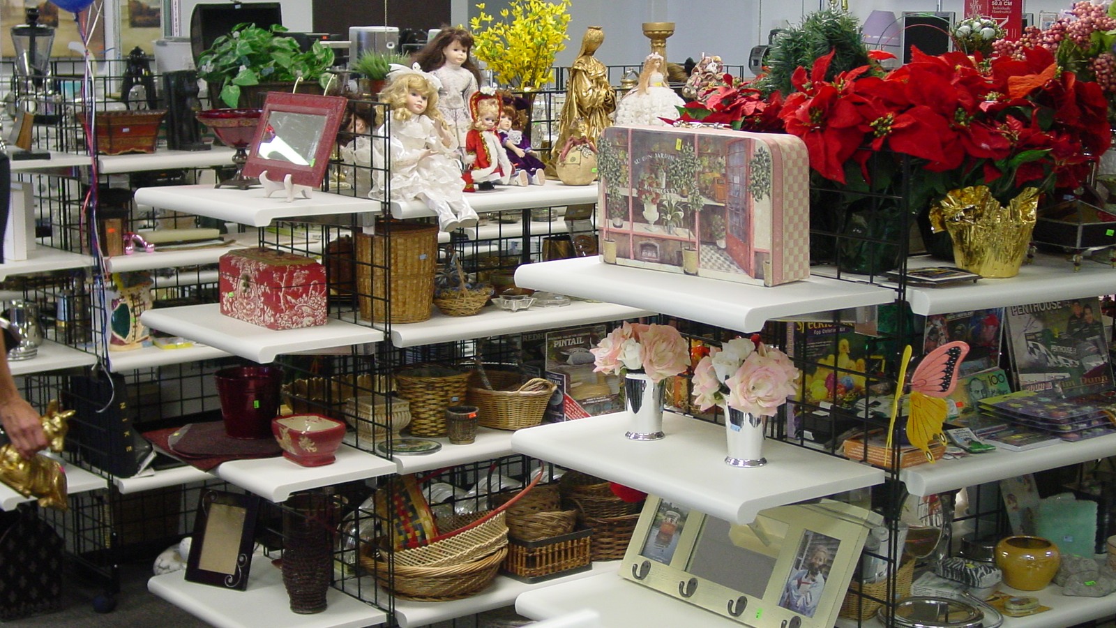 Seasonal decorations and bright floral pieces on display