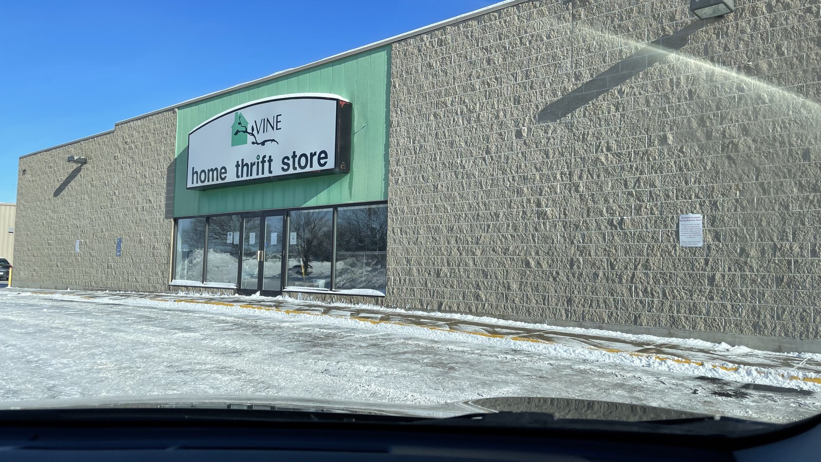 VINE Home Thrift Store storefront on a bright winter day in Mankato