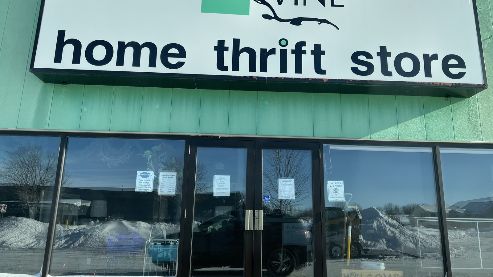 VINE Home Thrift Store sign and front entrance on Star Street