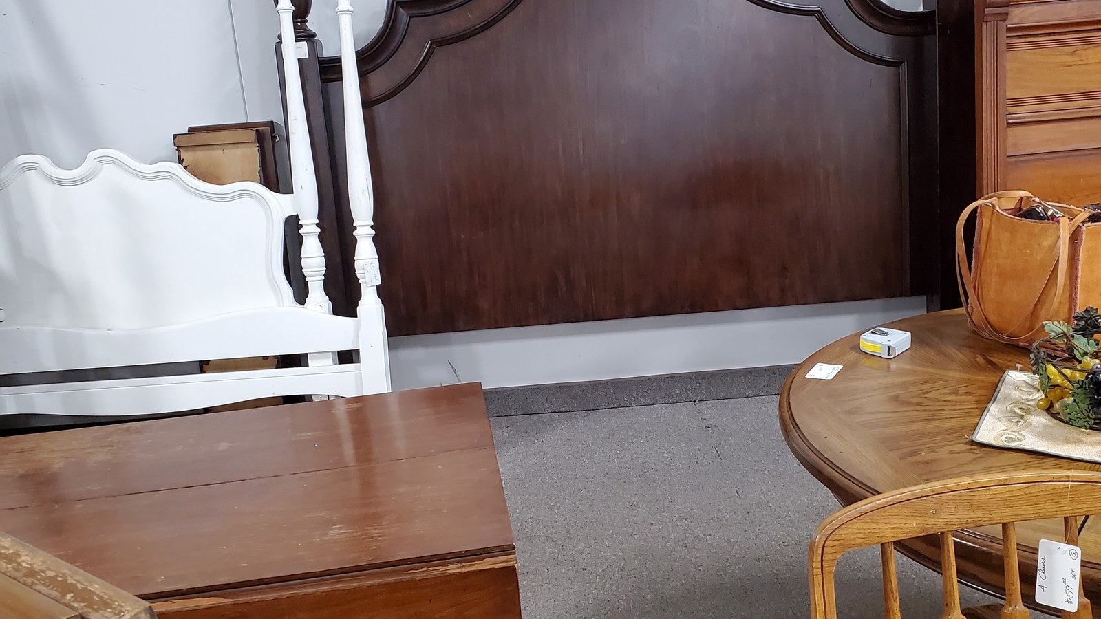 Wood headboards and side tables grouped on the furniture floor