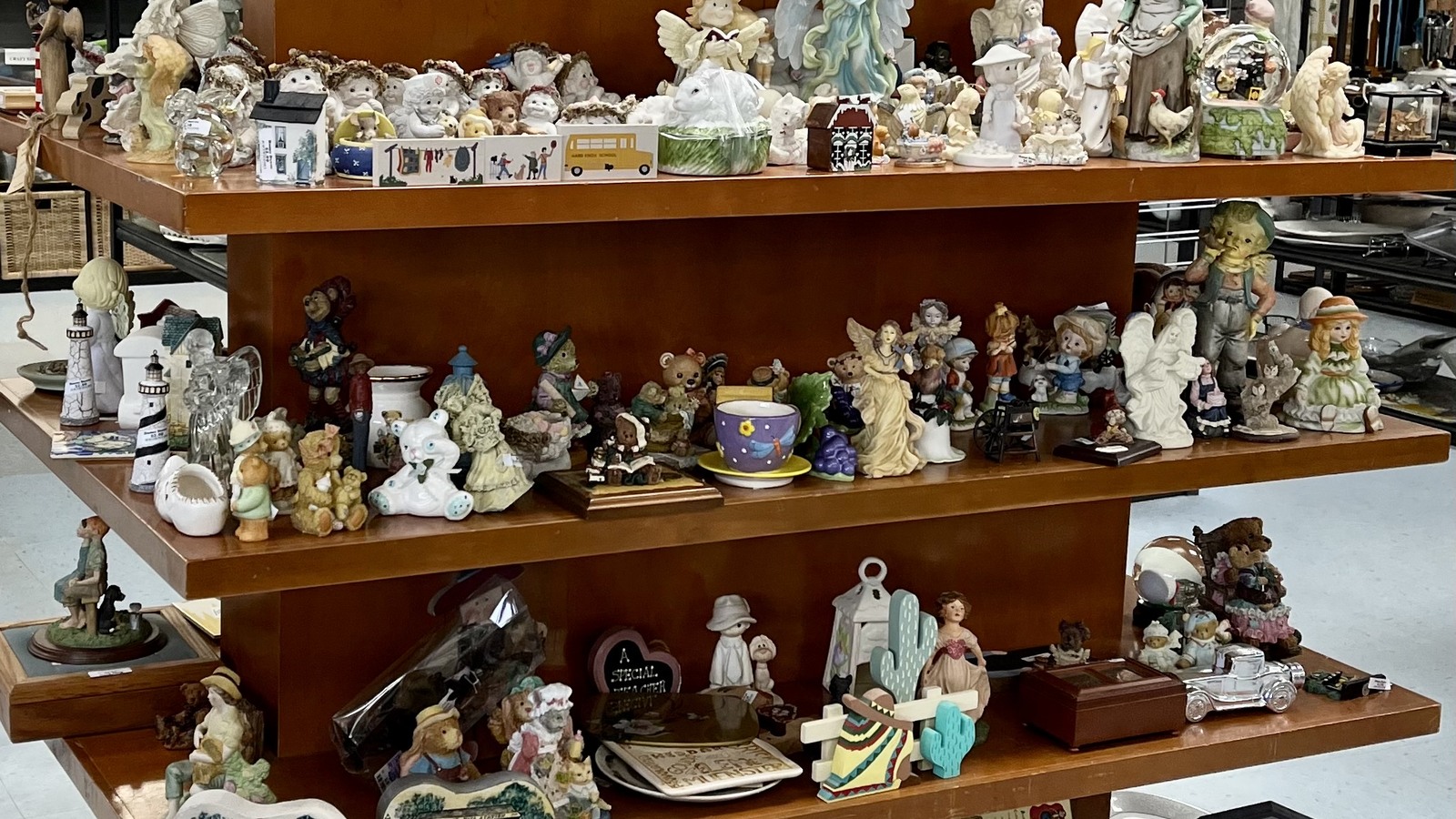 Shelves filled with collectible figurines and decorative pieces